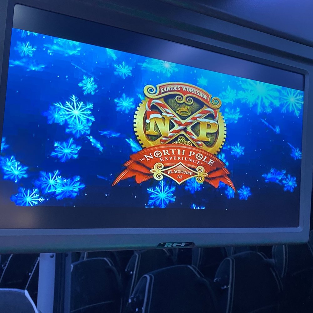 The North Pole Experience - Tv screens on the bus - Performing Arts Near Me - Flagstaff, Arizona The North Pole Experience - Tv screens on the bus - Performing Arts Near Me - Flagstaff, Arizona