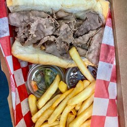 Home Run Inn Pizza - Hot fries, fresh roll, zingy giardiniera, tasty jus. Awful microwaved rubbery beef. Bad bad Chicago Italian beef sammich!