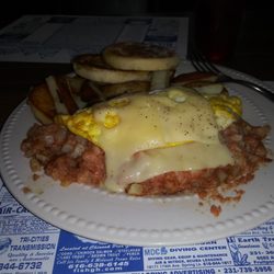 Corn beef hash and swiss cheese omelet.   They sure are not skimpy on the portions.   $10 with coffee, including tax.