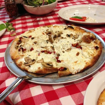 Grimaldi's Pizzeria - White with garlic, onion, mushroom, and sundries tomatoes. - Pizza Near Me - Allen, Texas