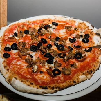 FIRED Pizza - a pizza with olives and mushrooms - Pizza Near Me - Stockton, California FIRED Pizza - a pizza with olives and mushrooms - Pizza Near Me - Stockton, California