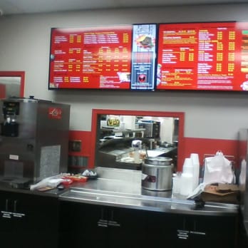 Lily's Wings, Burgers, & Things - The counter, order board, and a look into the kitchen. - Chicken Wings Near Me - St. Cloud, Minnesota
