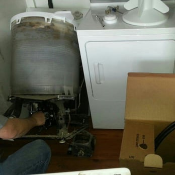 Appliance Ace Repairs - Joe installing a motor in a washer. - Appliances & Repair Near Me