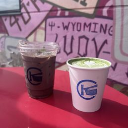 Left: Iced Black Christmas ( Seasonal Drink ) Right: Hot Killer Klown Banana Matcha Left: Iced Black Christmas ( Seasonal Drink ) Right: Hot Killer Klown Banana Matcha