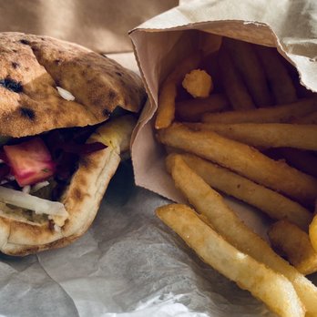 Falafel St. Jacques - a sandwich and french fries - Falafel Near Me - Lachine, Quebec Falafel St. Jacques - a sandwich and french fries - Falafel Near Me - Lachine, Quebec