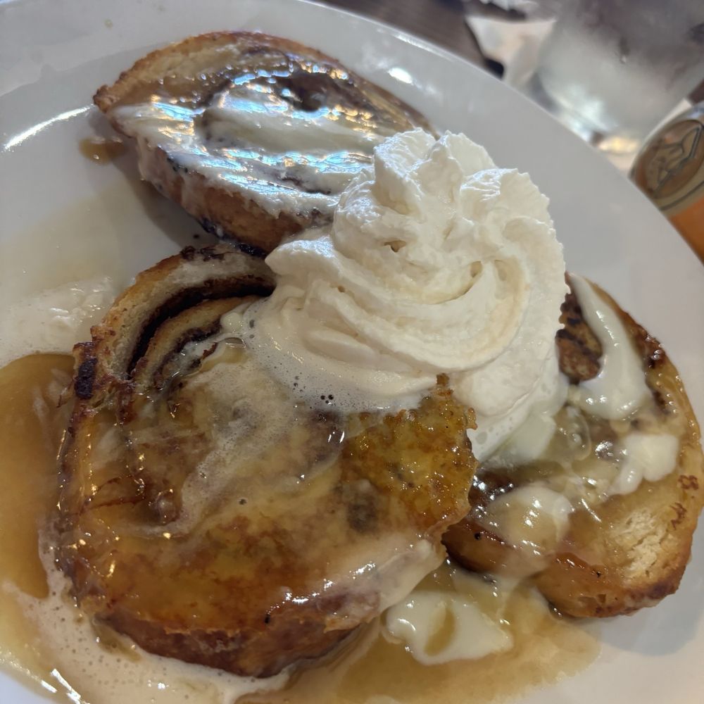 Another Broken Egg Cafe - Cinnamon Roll French Toast - I got the berries on the side - Breakfast & Brunch Near Me - Austin, Texas Another Broken Egg Cafe - Cinnamon Roll French Toast - I got the berries on the side - Breakfast & Brunch Near Me - Austin, Texas