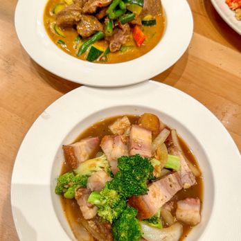 Little Plearn Thai Kitchen - Panang Nua (top) & Garlic Wok w/ Crispy Pork Belly (bottom) - Thai Near Me - Berkeley, California Little Plearn Thai Kitchen - Panang Nua (top) & Garlic Wok w/ Crispy Pork Belly (bottom) - Thai Near Me - Berkeley, California