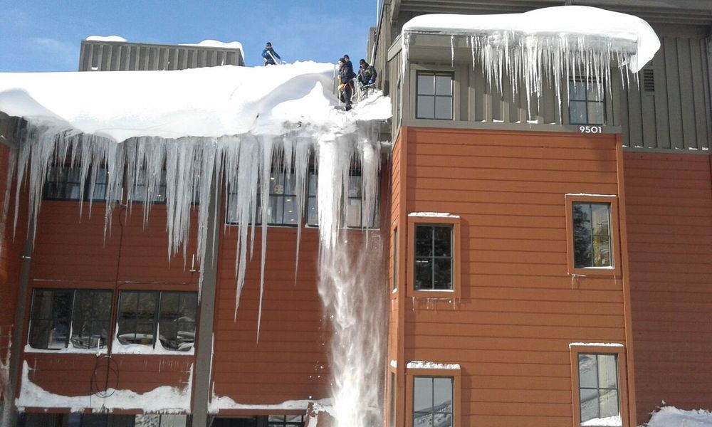 Slide of Mills Roofing