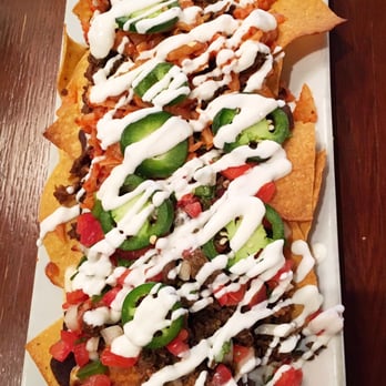 Lucha Tigre - Bulgogi nachos - Asian Fusion Near Me - Chapel Hill, North Carolina Lucha Tigre - Bulgogi nachos - Asian Fusion Near Me - Chapel Hill, North Carolina