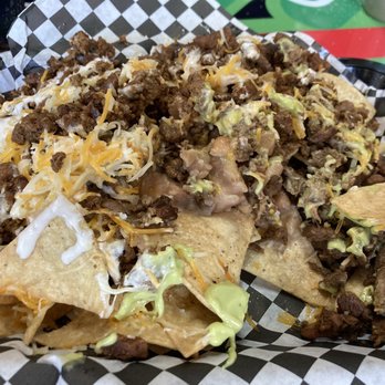 Calitacos Restaurant - Nachos... I had already went to town on this when I realized I hadn't taken a picture... - Tacos Near Me - Tolleson, Arizona Calitacos Restaurant - Nachos... I had already went to town on this when I realized I hadn't taken a picture... - Tacos Near Me - Tolleson, Arizona