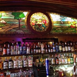 Tom's Tap - The century old stained glass back bar.