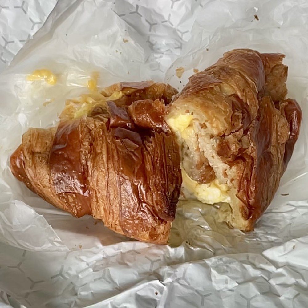 Bon Appetit Bakery - Luscious $4.50 loaded sausage egg cheese flakey piping-hot croissant! - Bakeries Near Me - Ellicott City, Maryland
