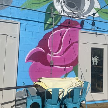 Creekside Bar And Bistro - a mural of a pink rose - American Near Me - Rosendale, New York Creekside Bar And Bistro - a mural of a pink rose - American Near Me - Rosendale, New York