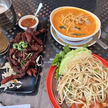 Olay's Thai Lao Cuisine - SEEN HAENG (beef jerky), Tam Mak Hoong (Lao papaya salad), Beef Red Curry - Thai Near Me - Honolulu, Hawaii Olay's Thai Lao Cuisine - SEEN HAENG (beef jerky), Tam Mak Hoong (Lao papaya salad), Beef Red Curry - Thai Near Me - Honolulu, Hawaii