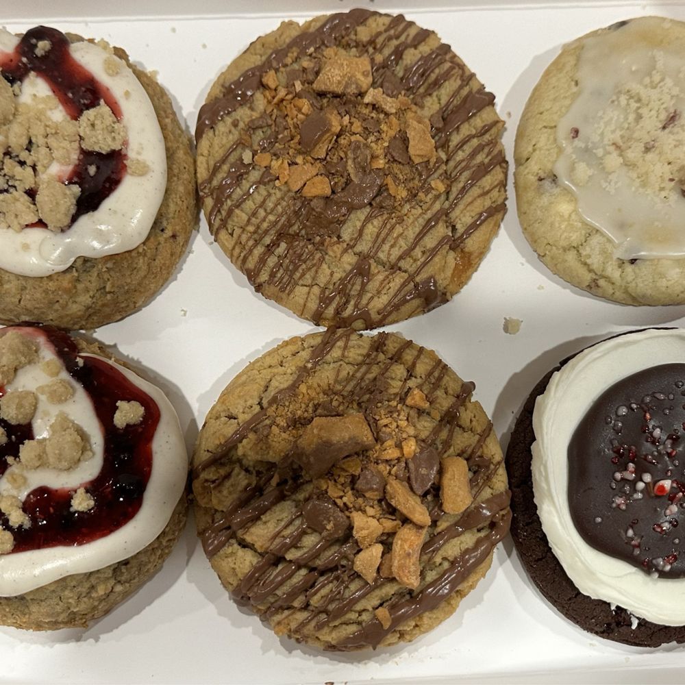 Crumbl - El Paseo - Triple Berry Cobbler, Peanut Butter Crisp, Candy Cane Brownie and Cranberry Crumb Cake - Bakeries Near Me - Fresno, California Crumbl - El Paseo - Triple Berry Cobbler, Peanut Butter Crisp, Candy Cane Brownie and Cranberry Crumb Cake - Bakeries Near Me - Fresno, California