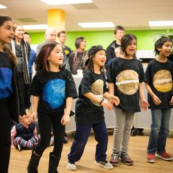 Khan Lab School - Students recite the periodic table in solar system shirts they created themselves