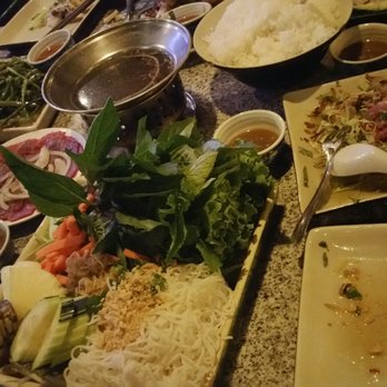 Tamarind Tree Restaurant - Table way too small to fit entire family meal entrees - Vietnamese Near Me - Seattle, Washington Tamarind Tree Restaurant - Table way too small to fit entire family meal entrees - Vietnamese Near Me - Seattle, Washington