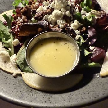 Malio's Beach House - This is the pear salad with goat cheese and candied pecans - Seafood Near Me - St. Pete Beach, Florida Malio's Beach House - This is the pear salad with goat cheese and candied pecans - Seafood Near Me - St. Pete Beach, Florida
