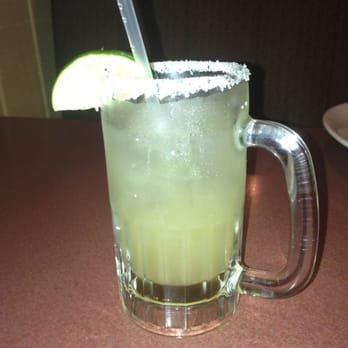Las Margaritas - a margarita in a glass with a straw and a lime slice - Mexican Near Me - Cleveland, Tennessee Las Margaritas - a margarita in a glass with a straw and a lime slice - Mexican Near Me - Cleveland, Tennessee