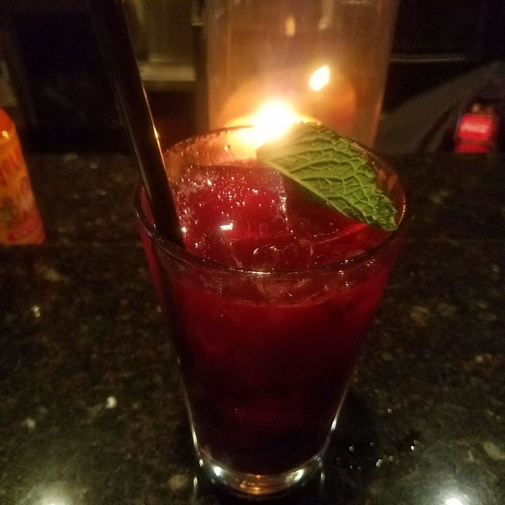 Copper Canyon Grill- Silver Spring - Blueberry Mojito by candlelight. - American Near Me - Silver Spring, Maryland