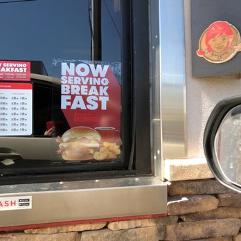Wendy's - a menu in the window of a fast food restaurant - Burgers Near Me - Scottsdale, Arizona Wendy's - a menu in the window of a fast food restaurant - Burgers Near Me - Scottsdale, Arizona