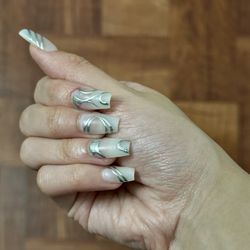 T Nails Spa - Index finger was nicked