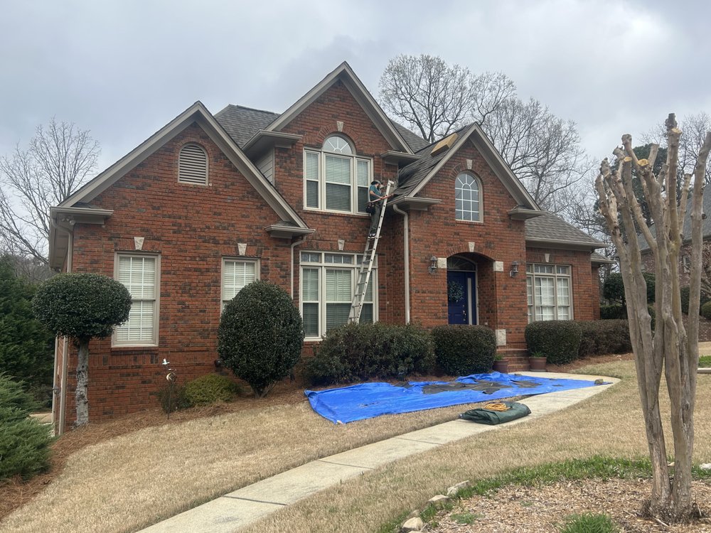 Slide of Dos Amigos Roofing