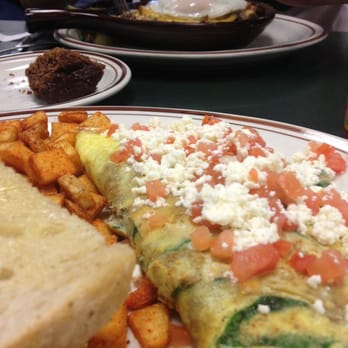 Egg Works - The Sundance Special omelette (front) and the Bacon, Ham and Sausage skillet (back) - Breakfast & Brunch Near Me - Las Vegas, Nevada