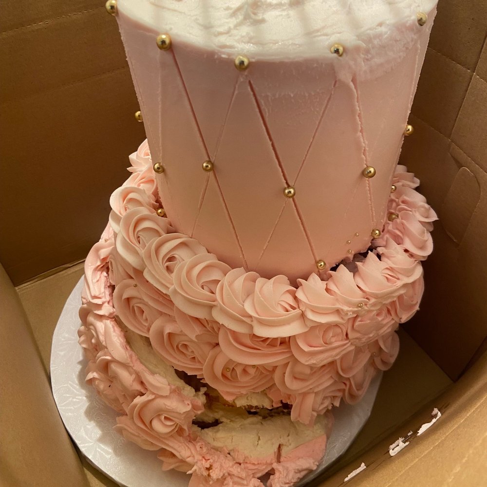 Collapsed cake with ugly crisscross markings Collapsed cake with ugly crisscross markings