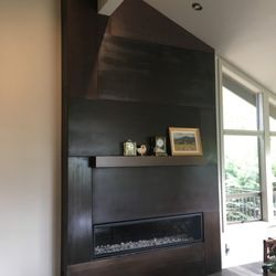 Elliott Specialty Metal - Cold Rolled Steel panels with patina. Fabricated for installation with no visible fasteners.
