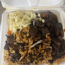 Tina's Takeout Restaurant - LOTS of oxtail in this dinner. I started eating before I took the photo. The plantains are also missing from the photo.