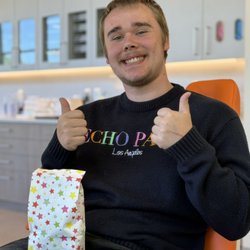 Sean Liu Orthodontics - Look how happy I am after braces and got goodies from staff