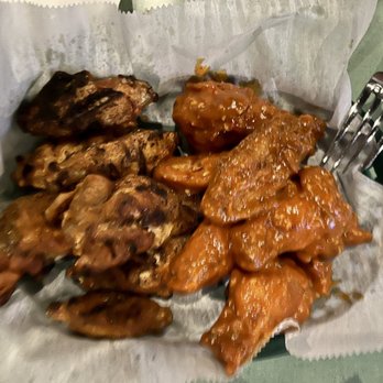 TomKen's Friendly Fried Chicken - right - grilled dry rub
left - fried with buffalo garlic - Chicken Wings Near Me - Milwaukee, Wisconsin TomKen's Friendly Fried Chicken - right - grilled dry rub
left - fried with buffalo garlic - Chicken Wings Near Me - Milwaukee, Wisconsin