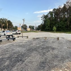 Hachi Hachi Japanese Grill - Parking lot and picnic tables for enjoying your meal