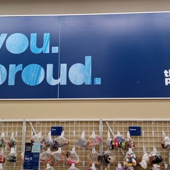 Savers - A large blue banner with the message "Be you. Be proud." is displayed above a plush toy section at Thrift Proud, featuring various stuffed animals and toys. - Thrift Stores Near Me - Manchester, Connecticut
