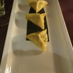 Kanton Restaurant - Ravioli di farina e zucca con ripieno di verdura ed erba cipollina.