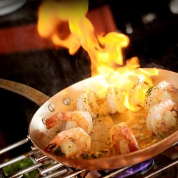 HQ Services Touristiques - Shrimp flambée of Evening Gourmet Tour