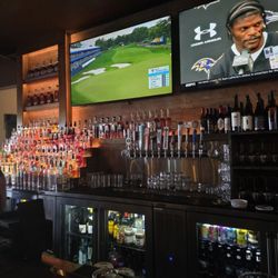 Bar area with 2 large screen tvs
