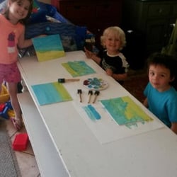Playtime Daycare & Preschool - Painting Father's Day cards.