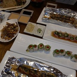 Top gun roll, yellow tail lover roll, spicy chicken hibachi + yum yum sauce, mixed tempura veggies, & yellowtail jalapeño Top gun roll, yellow tail lover roll, spicy chicken hibachi + yum yum sauce, mixed tempura veggies, & yellowtail jalapeño