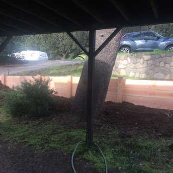 Premium Landscape & More - New, beautiful wood retaining wall w/ drainage. - Tree Services Near Me