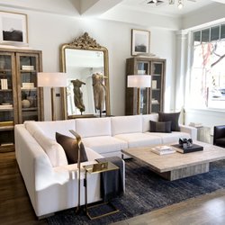 RH Walnut Creek | The Gallery at Broadway Pointe - Love the mirror, coffee table and cabinet