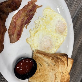 Biscuits Cafe - (2) Eggs bacon and sourdough bread - Breakfast & Brunch Near Me - Glendale, Arizona