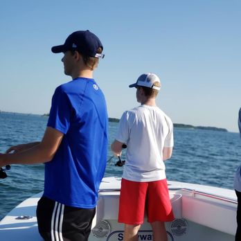 Snap Shot Charters - Cousins fishing Adam (in blue) 1st time fishing in America ! - Boat Charters Near Me