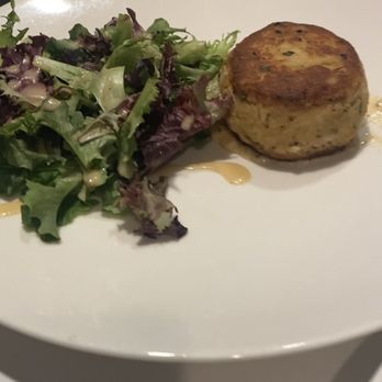 Harvest & Reel - Crab cake with wide Salad. Tasty & not too "fishy". - American Near Me - St. Augustine, Florida