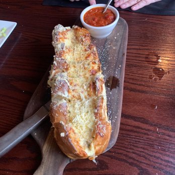 Nolan’s - Cheesy garlic bread with marinara sauce - Seafood Near Me - Canandaigua, New York