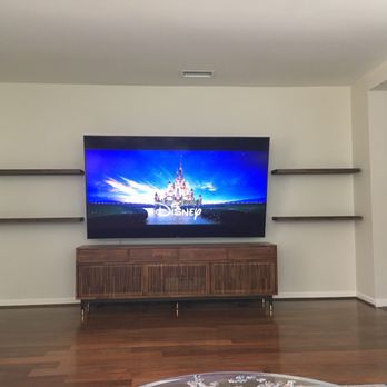 Eugene's Handyman Services - Floating shelves installed around our 85" TV. Look great! - TV Mounting Near Me Eugene's Handyman Services - Floating shelves installed around our 85" TV. Look great! - TV Mounting Near Me