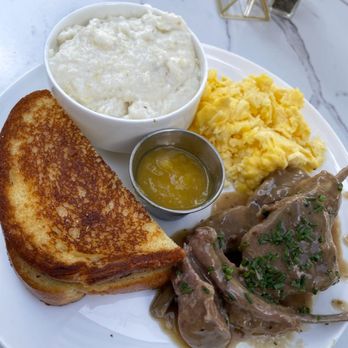 Breakfast At Barneys - Food: Lamb and Egg breakfast with toast and grits. Drinks: Peach Tea and Water - Breakfast & Brunch Near Me - Atlanta, Georgia Breakfast At Barneys - Food: Lamb and Egg breakfast with toast and grits. Drinks: Peach Tea and Water - Breakfast & Brunch Near Me - Atlanta, Georgia