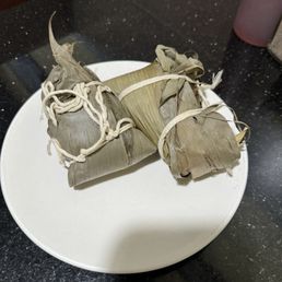 Gifted sticky rice wrapped with mung beans and pork - yummy Chinese new year custom; so grateful
