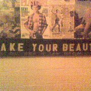 Photo of Eastern Bloc - New York, NY, United States. Wall of Porn in restroom